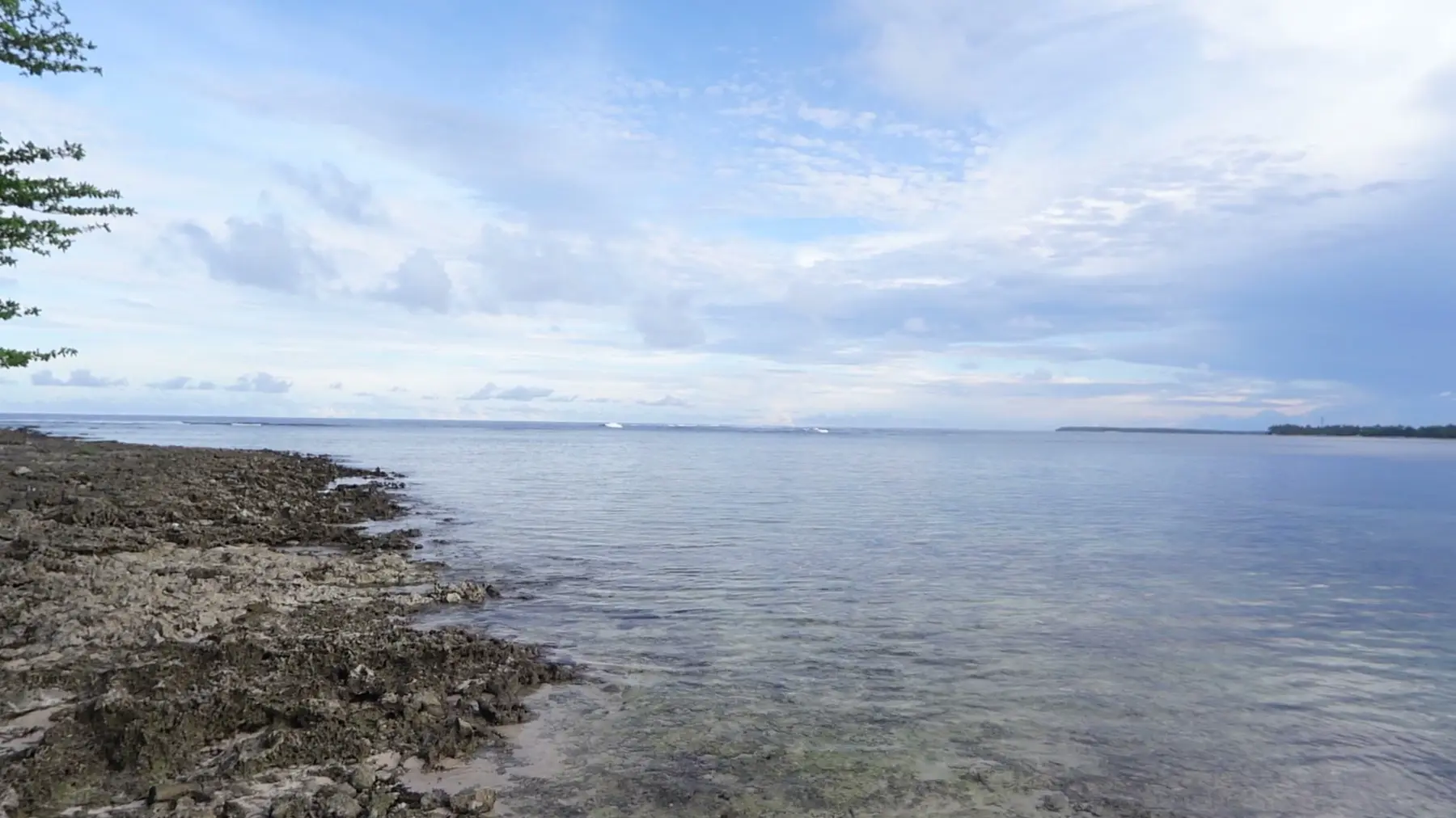 Calm sea and rocky shoreline on Siargao Island at the festival venue